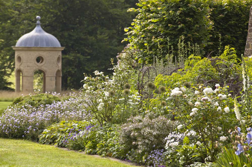 Woolbeding-Gardens---herbaceous-borders-with-rotunda-beyond,-credit-National-Trust-Images,-Chris-Lacey